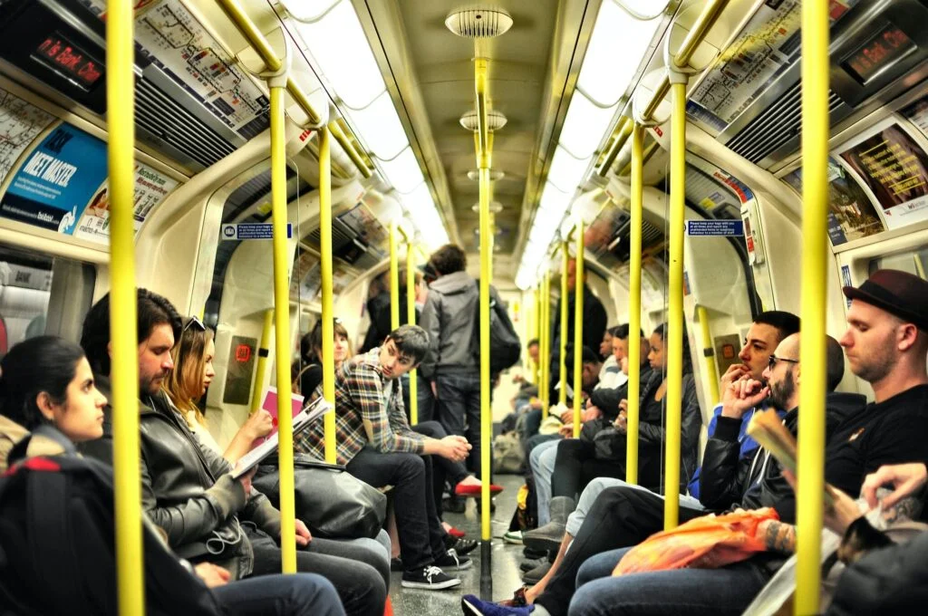 Passengers on London underground train - night tube