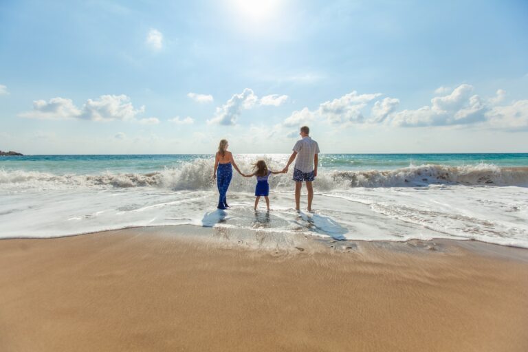 Family of 3 on beach