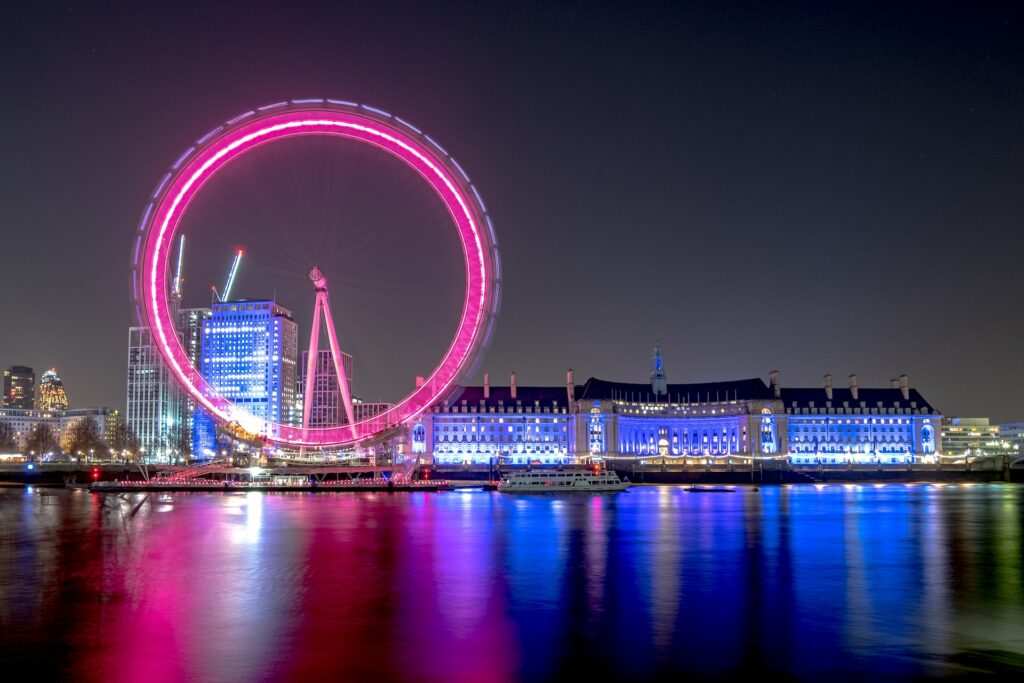 The London Eye and County Hall, London, illuminated at night