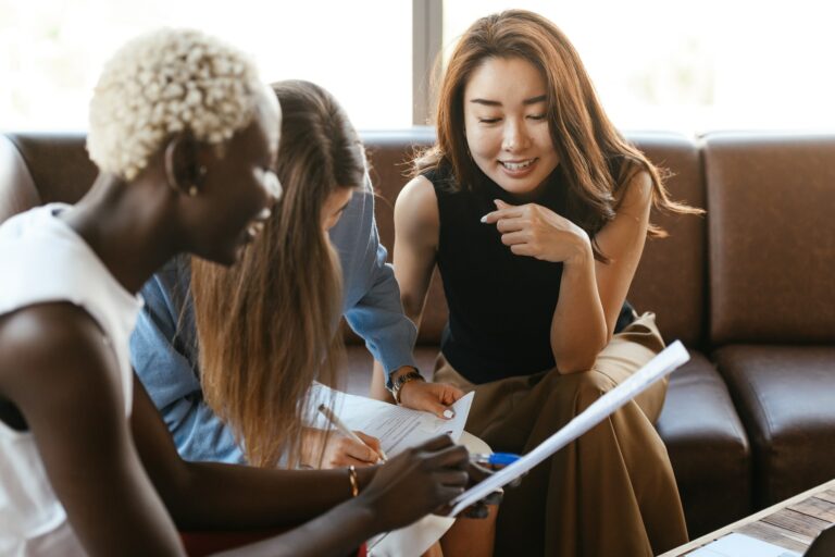 Three ladies discussing work