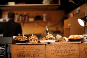 Dishes lined up at a food stall in Camden Market, London.